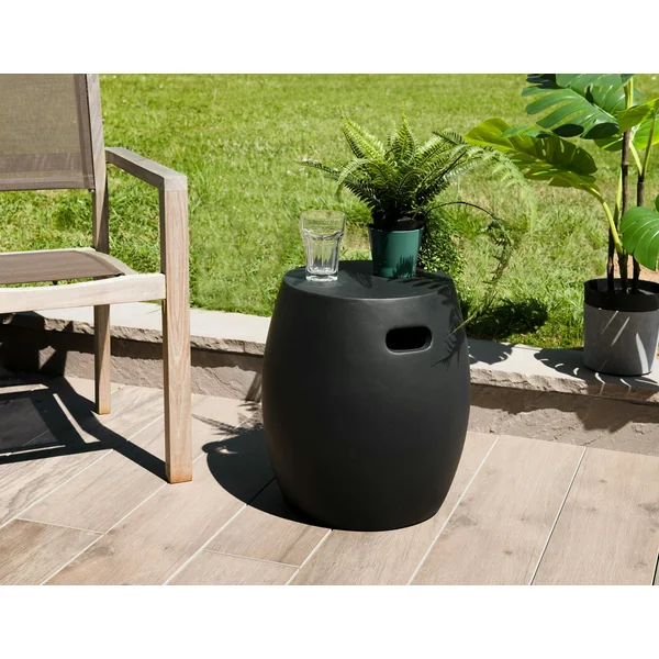 Petite table basse de jardin béton noir forme tonneau HERCULE